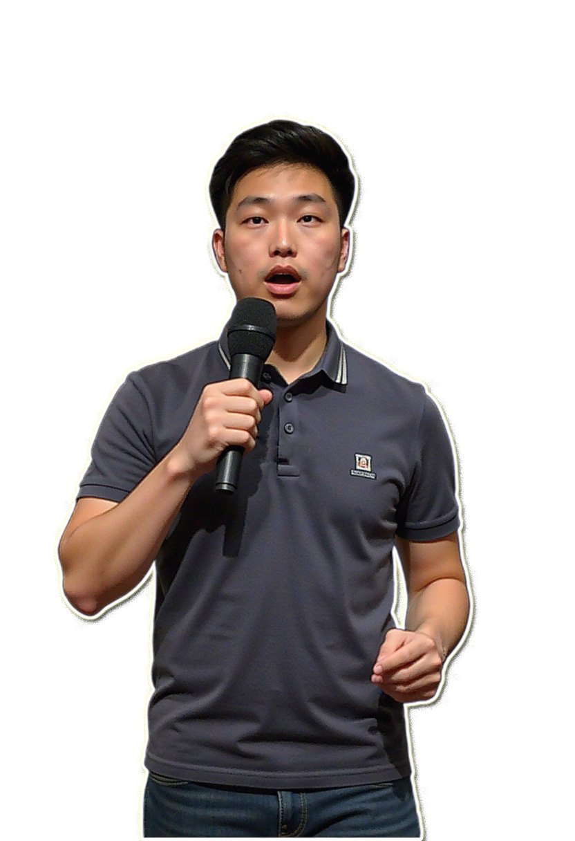 A man in a blue shirt with a happy expression